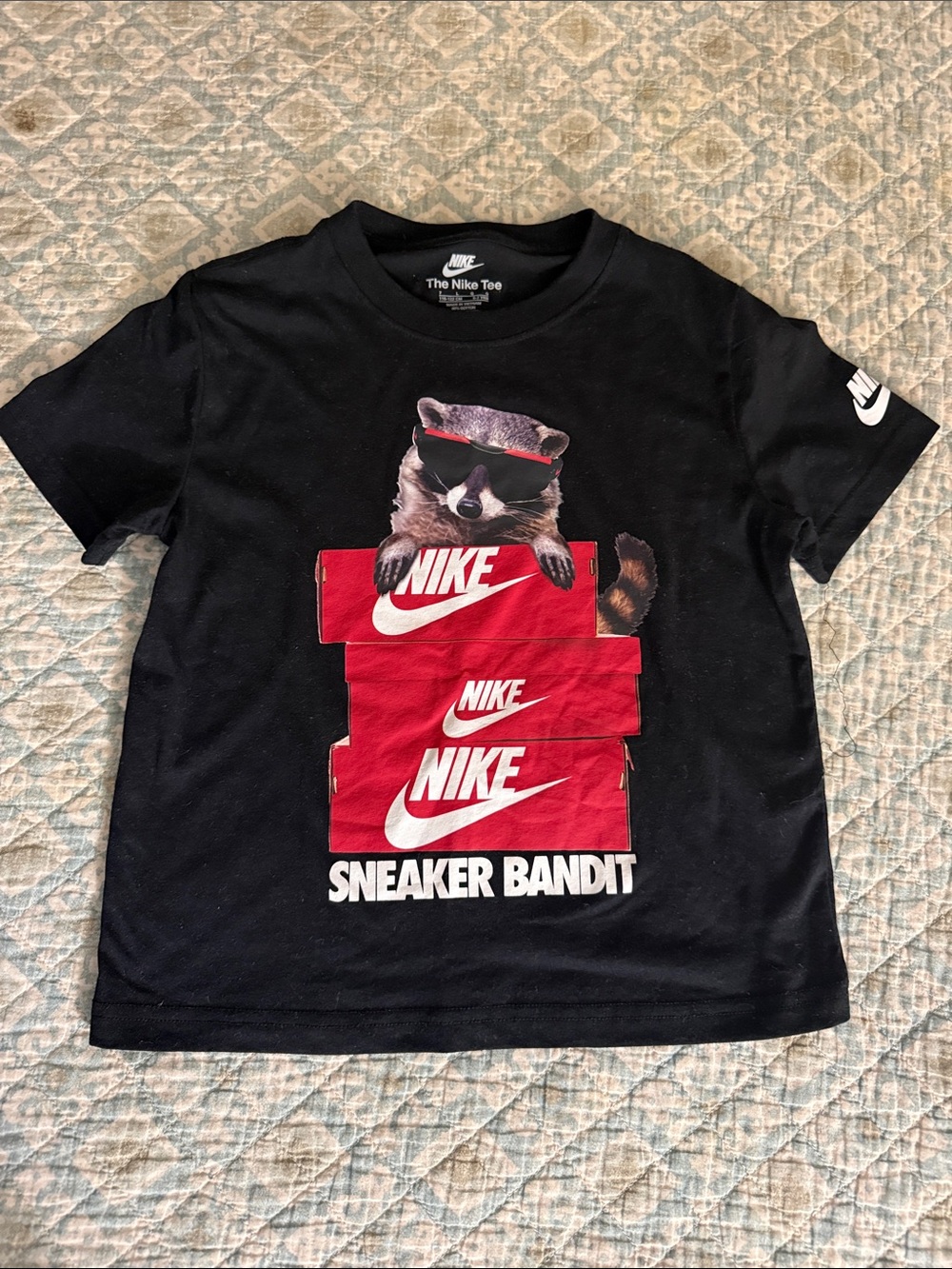 Nike Black Kids Tee with Red Sneaker Boxes and Raccoon Graphic